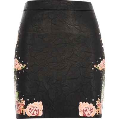 Black faux leather floral mini skirt